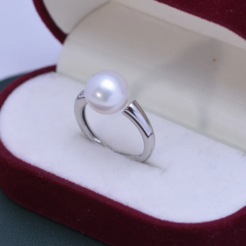 Bague femme en argent S925, perle blanche d'eau douce 10-11mm, forme ronde parfaite. Un bijou élégant et intemporel.