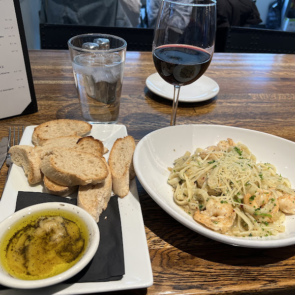 GF bread with a puréed garlic dip. And shrimp scampi.