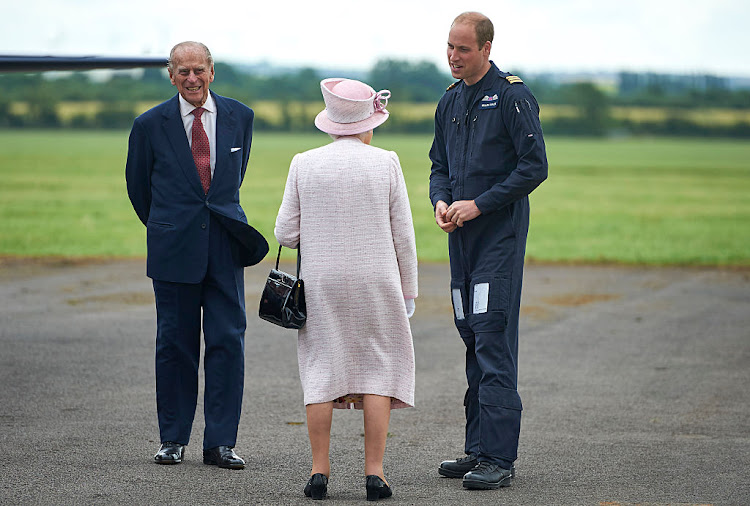 Prince William with his grandparents Queen Elizabeth II and Prince Philip. The duke has given an update on his grandfather's health days after he was hospitalised.