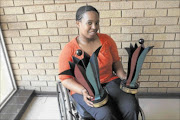 PROUD: 
      Nolwazi Madlala, an intern  at 1Military Hospital in Pretoria, 
      
        won two NYDA awards
      
      . 
      Photo:  PEGGY  NKOMO