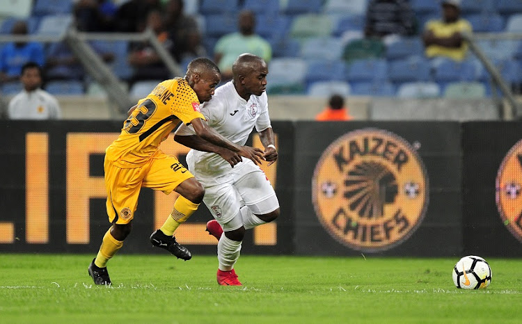 Joseph Molangoane of Kaizer Chiefs FC chases the ball with Patrick Phungwayo of Free State Stars FC during the Absa Premiership 2017/18 game between Kaizer Chiefs and Free State Stars at Moses Mabhida Stadium, Durban on 25 November 2017.