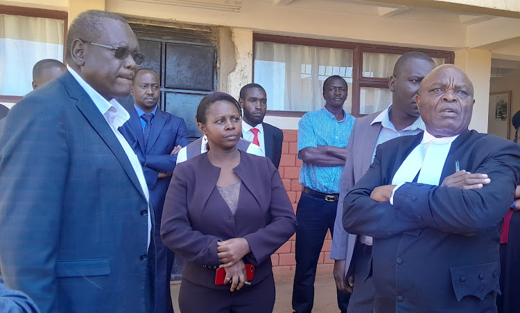 High Court judge Reuben Nyakundi (R) with ex-envoy Kipyego Cheluget during a visit to the estate of the late Edward Limo in Eldoret