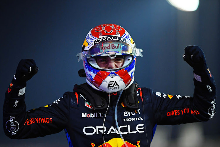 Max Verstappen celebrates in parc ferme after winning the F1 Grand Prix of Bahrain.