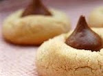 Jennah's Famous Peanut Butter Blossoms was pinched from <a href="http://allrecipes.com/Recipe/Jennahs-Famous-Peanut-Butter-Blossoms/Detail.aspx" target="_blank">allrecipes.com.</a>