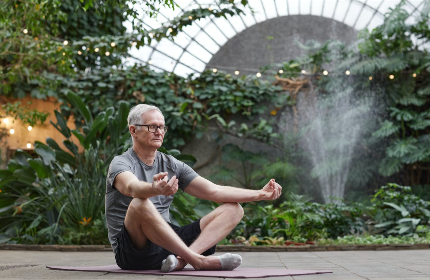 man meditating on yoga mat