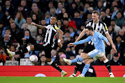 Bernardo Silva scores Manchester City's second goal in their FA Cup quarterfinal win against Newcastle United at Etihad Stadium on Saturday.