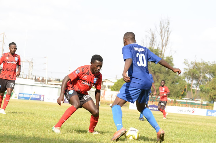 AFC Leopards fullback Lewis Bandi (L) battles with Steiner Musasia of Posta Rangers during their FKF Premier League match at Ruaraka grounds on Saturday.