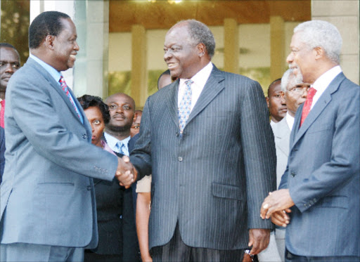 ODM leader Raila Odinga, President Mwai Kibaki and former UN Secretary General Kofi Annan during the signing of the National Accord on February 1, 2008.