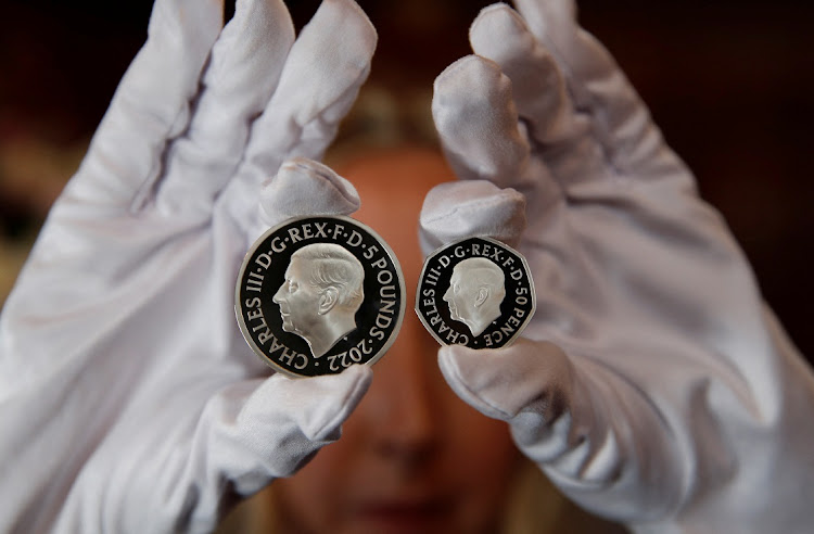 The official coin effigy of Britain’s King Charles III is seen on a £5 crown and 50 pence coin, unveiled by The Royal Mint.