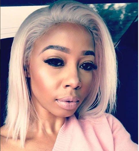 Kelly Khumalo slammed a troll who poked fun at her pain.