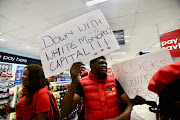 EFF protesters invaded the Clicks outlet in Oxford Street in East London to demonstrate against racism. 