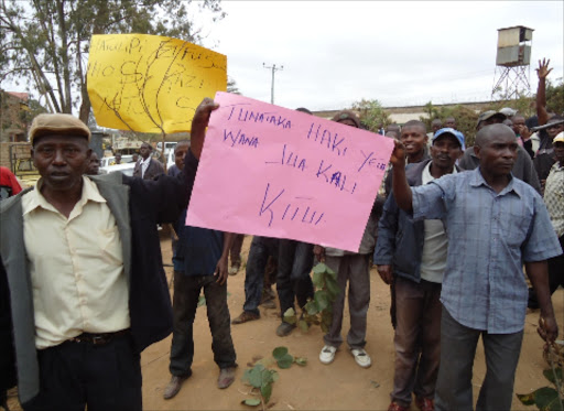 NO WAY: Kitui artisans during their demonstration to oppose the council’s plans to move them to a new site. Photo/Musembi Nzengu