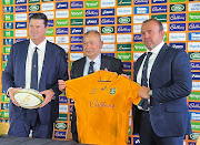 New Australia rugby coach Eddie Jones poses with Rugby Australia chair Hamish McLennan and CEO Andy Marinos after his first news conference since his reappointment, which was held at Matraville Sports High School in Sydney, Australia on January 31 2023. 