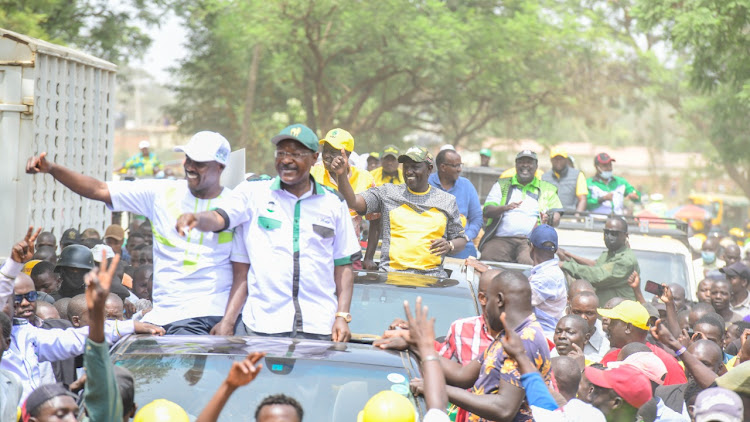 Deputy President William Ruto together with ANC party leader Musalia Mudavadi and Ford Kenya leader Moses Wetangula during a rally at Uchumi Kwanza, Posta Grounds, Bungoma County.