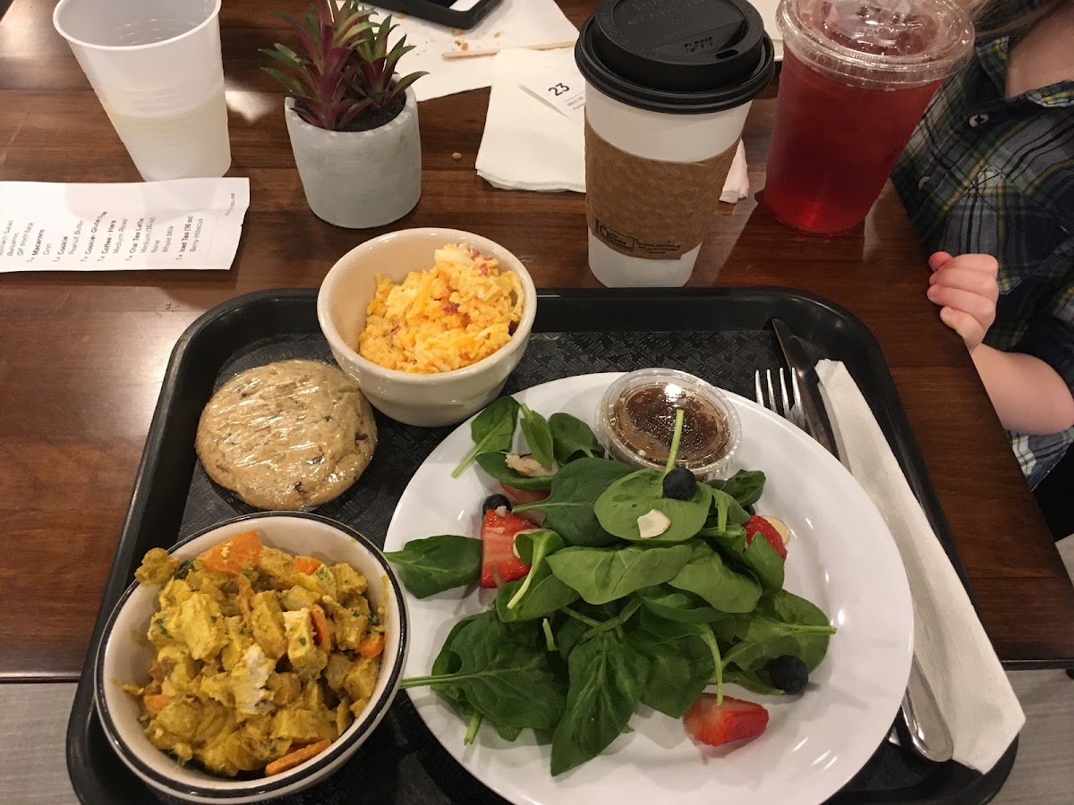 “Pick three” option. Tofu curry salad, spinach salad, pimento cheese. Peanut butter cookie, chocolate chip cookie. Chai latte, berry hibiscus iced tea :).