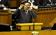 President Jacob Zuma answers questions in the National Assembly on August 6, 2015 in Parliament in Cape Town, South Africa.