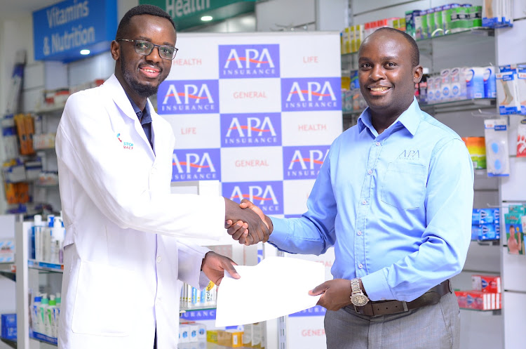 Pharmtech's Wilfred Muchina and APA Insurance Head of Health David Mumo.