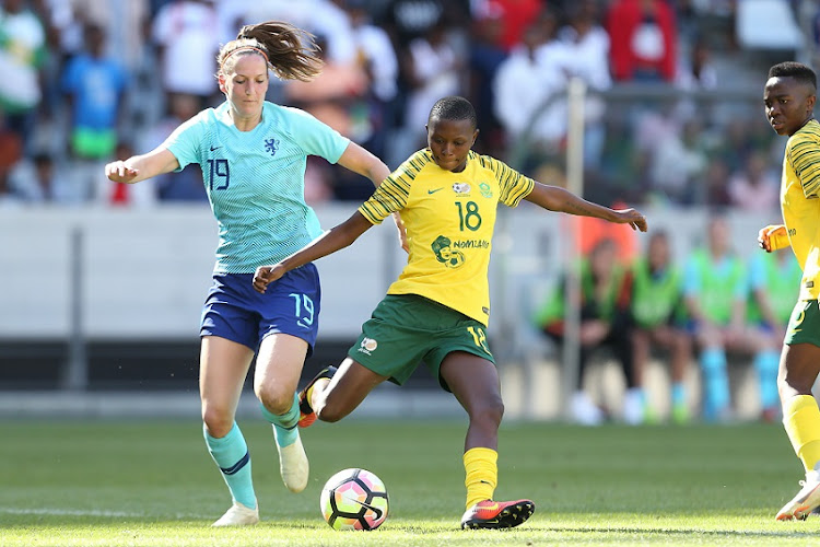 Banyana Banyana's Nompumelelo Nyandeni is challenged by Ellen Jansen of Holland in an international friendly at Cape Town Stadium in 2019. File photo.