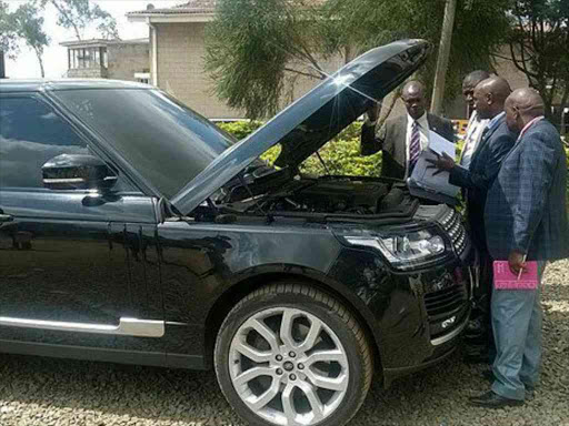 Water CS Eugene Wamalwa's Range Rover being inspected by KRA officers at Railways Club Photo/Courtesy