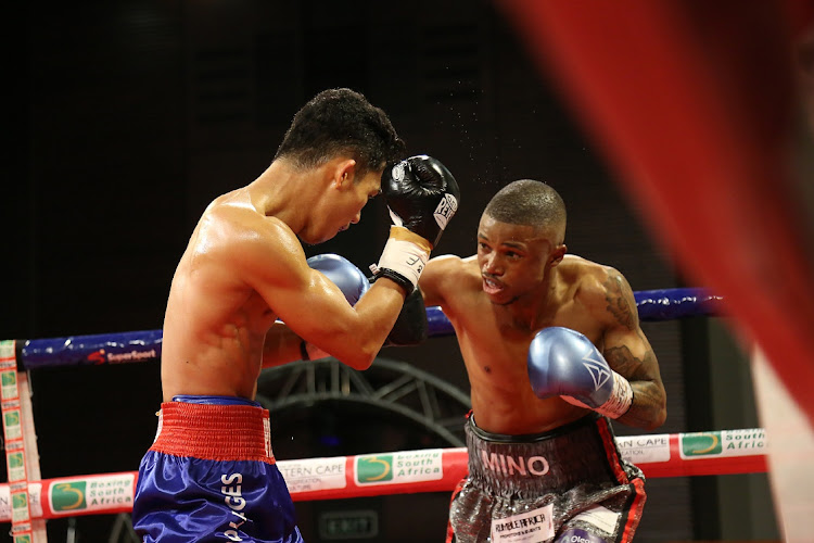 Sivenathi Nontshinga, right, beat Regie Suganob in the first defence of his title in East London in July.