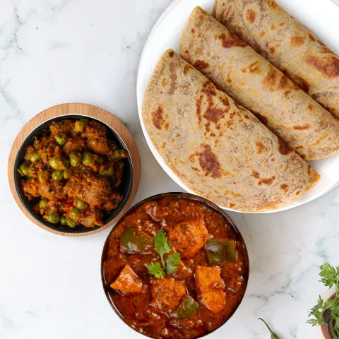 Kadhai Chicken, Soya Masala Sabzi, Paratha Thali