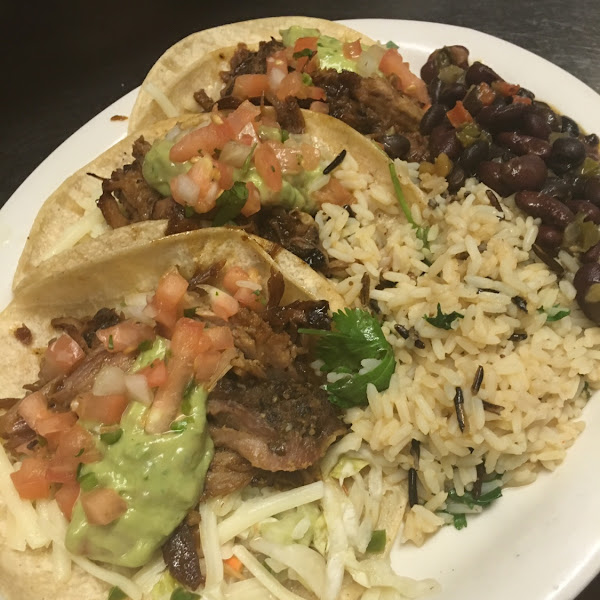 Pork Tacos with curry stewed beans and rice on corn tortillas