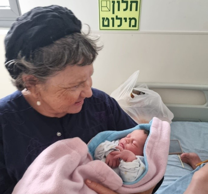 Marcelle Talia cradling her grandchild on October 6, a day before she was killed in Israel.