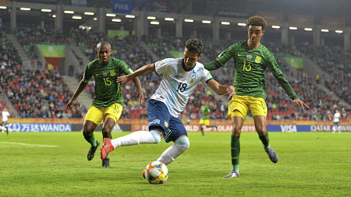 Cristian Ferreira of Argentina is challenged by SA's Keenan Phillips and Siphesihle Mkhize during their U-20 World Cup match at Tychy Stadium in Poland. Amajita have been eliminated.