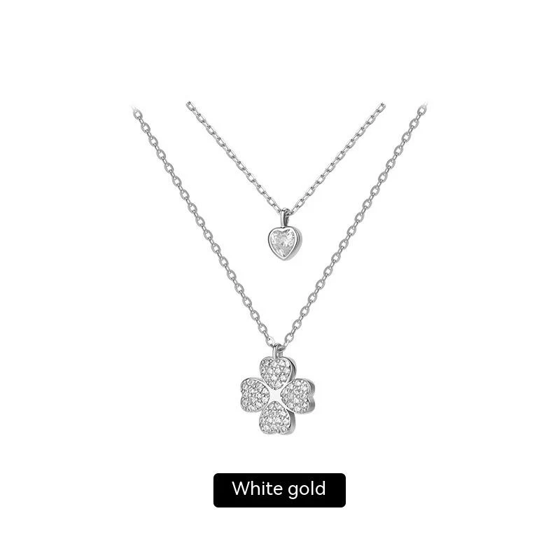 Collier de clavicule double couche trèfle doré et argent sterling pour femmes Un bijou élégant et raffiné pour sublimer votre décolleté au quotidien.
