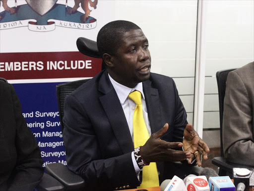 Institution of Surveyors of Kenya chairman Stephen Ambani speaks to journalists at the ISK offices in Nairobi on July 26 last year / FILE