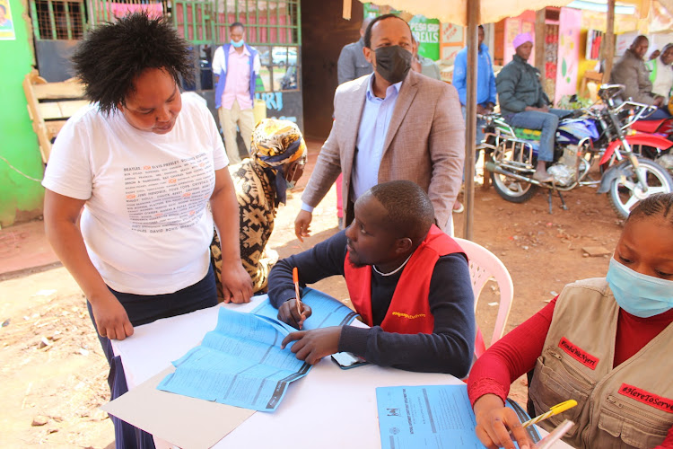 Nyeri town MP Ngunjiri Wambugu visits one of the centers used to issue CDF bursary forms at Gatitu shopping center in Nyeri town on Tuesday