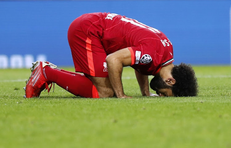 Liverpool's Mohamed Salah celebrates his team's third goal in the Champions League Group B against Porto at Estadio do Dragao, on September 28, 2021