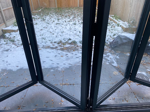 Bi-folding doors in opening position.