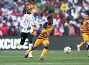 Kabelo Mahlasela of Kaizer Chiefs challenged by Fortune Makaringe of Orlando Pirates during the 2019 Carling Black Label Cup match between Kaizer Chiefs and orlando Pirates at the FNB Stadium, Johannesburg on the 27 July 2019.