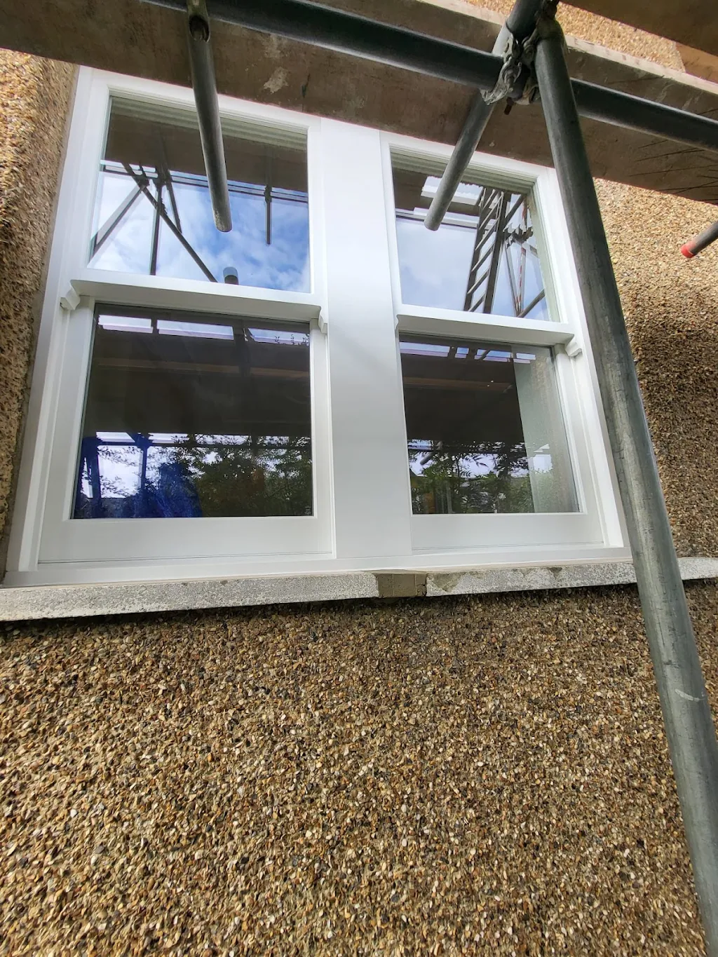 Album cover: Double sash and a small casement window
