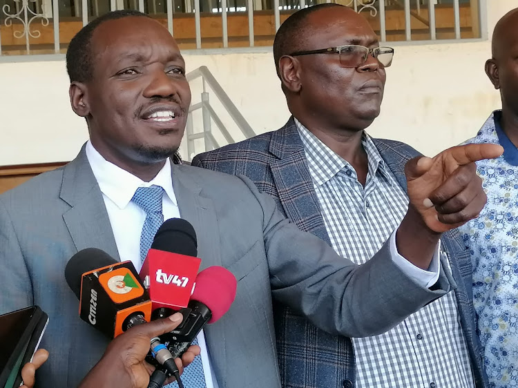 Kisii Governor Simba Arati addressing journalists outside his office on Monday