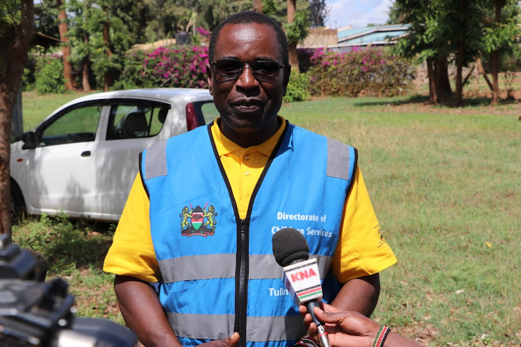 Deputy director in charge of children's services and social protection Muhambi Mogare addressing the press in Wang'uru on Wednesday