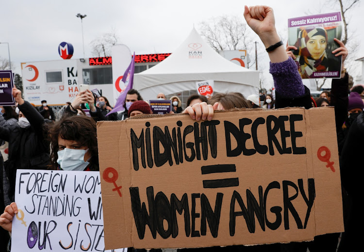 Activists hold placards during a protest against Turkey's withdrawal from Istanbul Convention, an international accord designed to protect women, in Istanbul, Turkey on March 19, 2021.