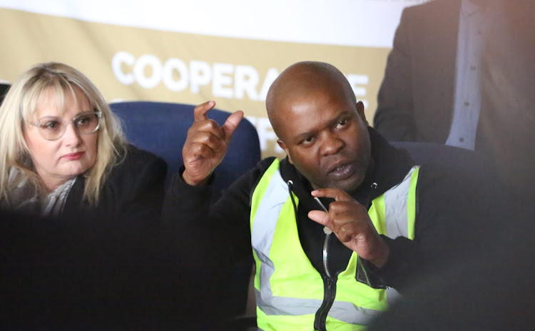 Gauteng Cogta MEC Lebogang Maile and Ekurhuleni mayor Tania Campbell speak at a Thembisa community forum engagement.