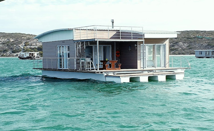 One of the four luxury houseboats moored just offshore of Kraalbaai.