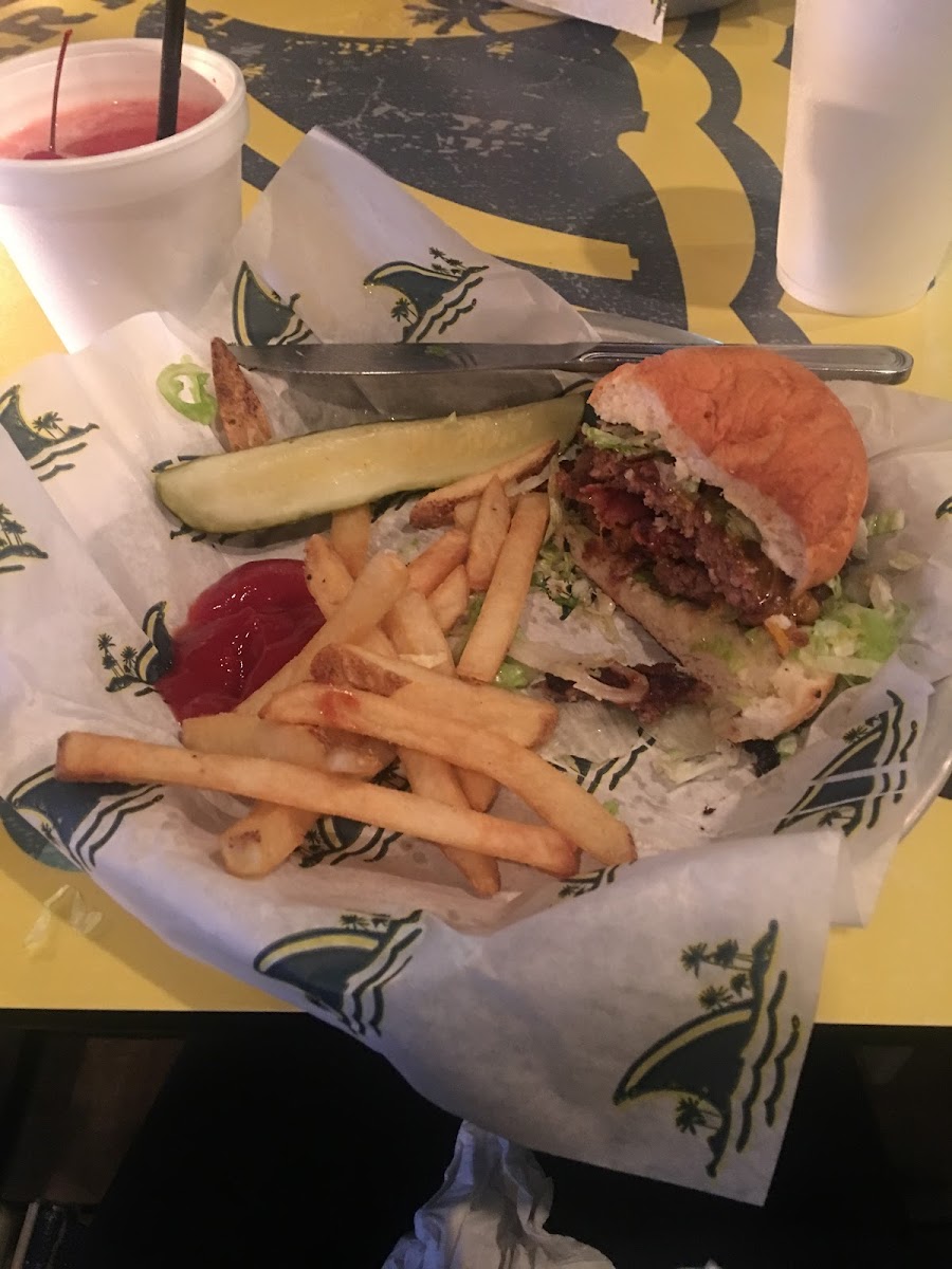 Burger on GF bun with fries from a dedicated fryer