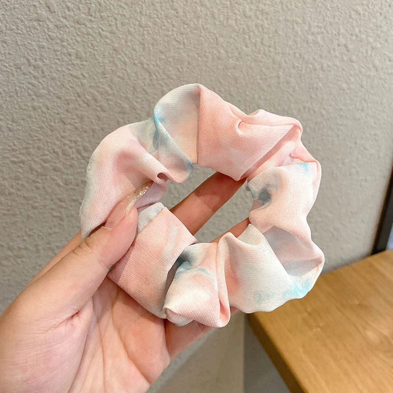 Tie The Head Haargummis für sicheren Halt und stilvolle Frisuren. Strapazierfähig, elastisch und ideal für jeden Anlass.