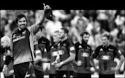 JOB WELL DONE: South Africa's Bulls captain Victor Matfield gestures to the fans after winning the semifinal of the Super 14 rugby match against New Zealand's Crusaders at Loftus Versfeld stadium in Pretoria on Saturday.  23/05/2009. Pic. Themba Hadebe. © AP