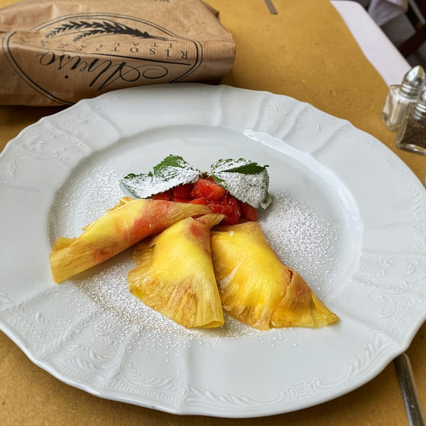 Pineapple ravioli with mascarpone cream and strawberries