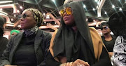 Lerato Sengadi seated next to her mom at Jabba's funeral. 
