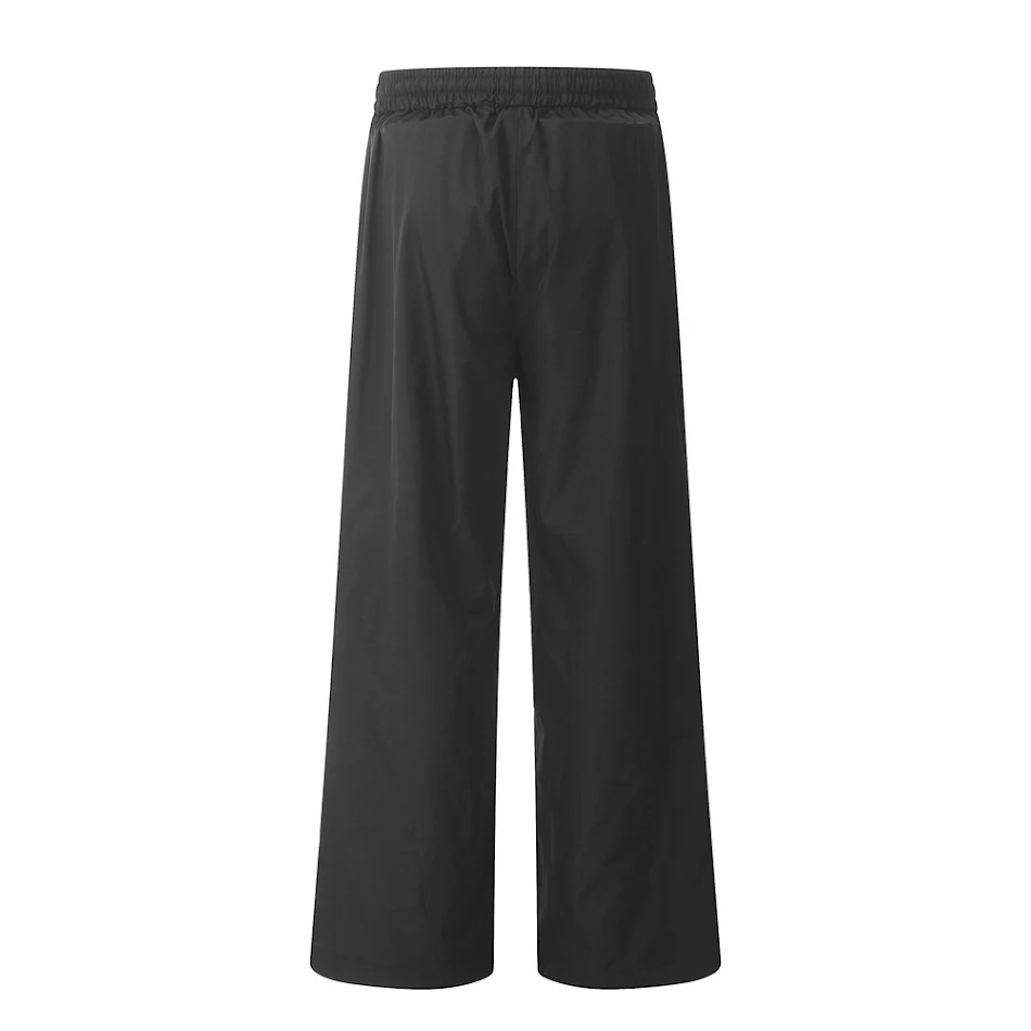 Pantalones informales de paracaidista plisados de color liso para hombre perfectos para un estilo casual y cómodo. Disfruta de un ajuste relajado con estos pantalones.