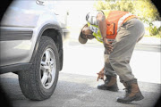 BUSY: Ex-Moroka Swallows player William Makhura is now a traffic officer in Limpopo. PHOTO: ELIJAR MUSHIANA