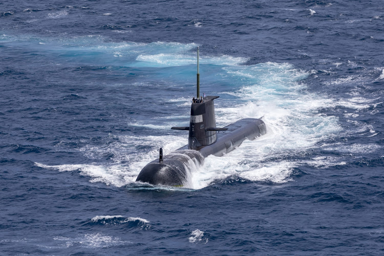 The HMAS Rankin surfaces during a maritime exercise between the Royal Australian Navy and the Indian Navy, off the coast of Darwin, Australia, September 5 2021. Picture: POIS YURI RAMSEY/AUSTRALIAN DEFENCE FORCE/GETTY IMAGES