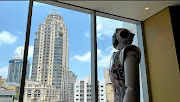 Micah, Lexi and Ariel are robots designed to help with tasks at Hotel Sky in Sandton, Johannesburg.