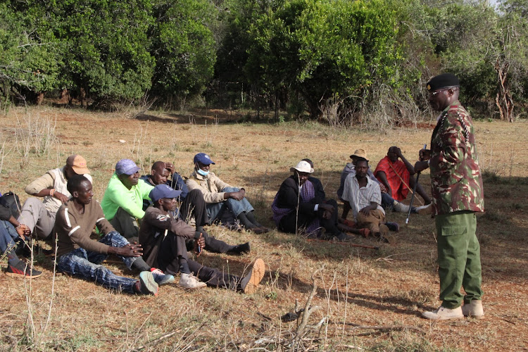 Mukogodo assistant county commissioner in Laikipia North Peter Ole Ng'eny addresses residents of Lokusero village on Tuesday, February 1.